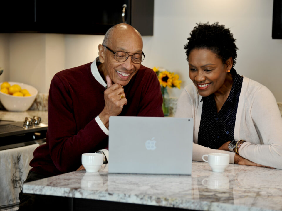 couple looking at laptop