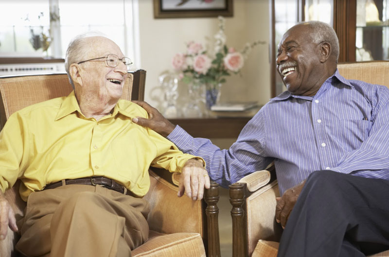two men laughing with each other