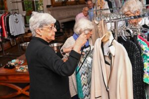 Women in IRC Shoppe looking at clothes.