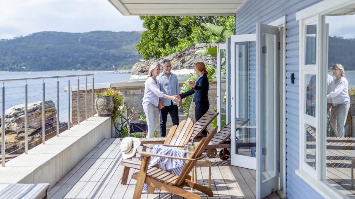 family checking into their summer home