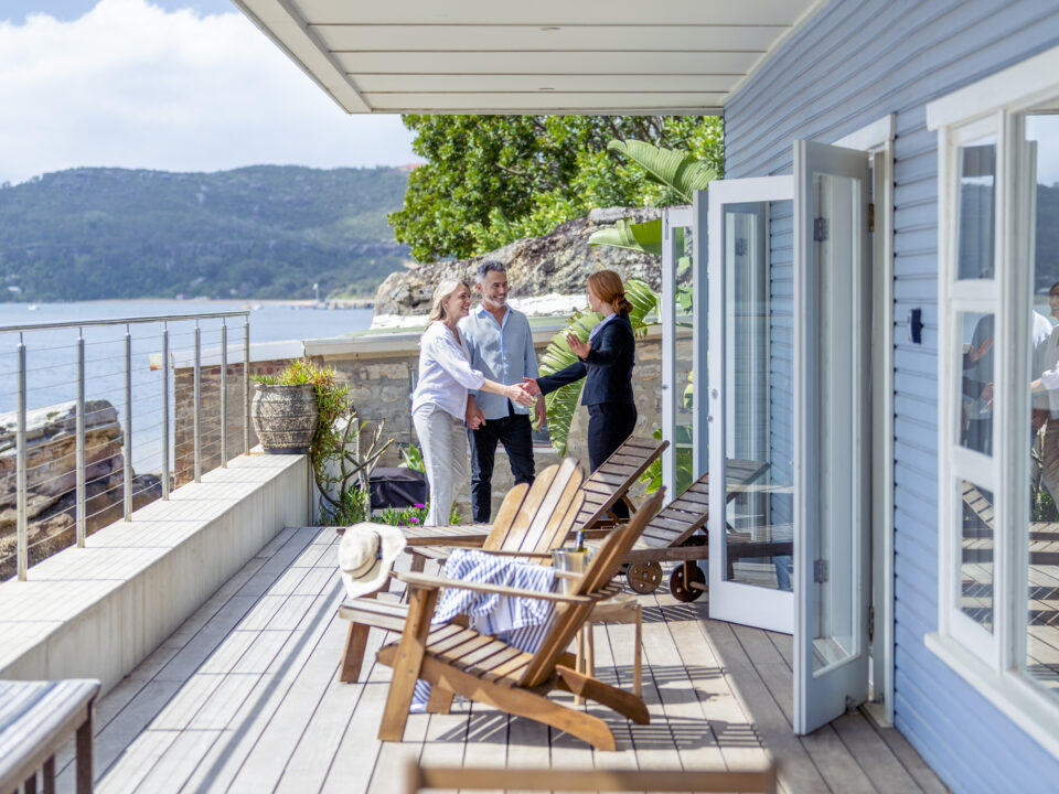 family checking into their summer home