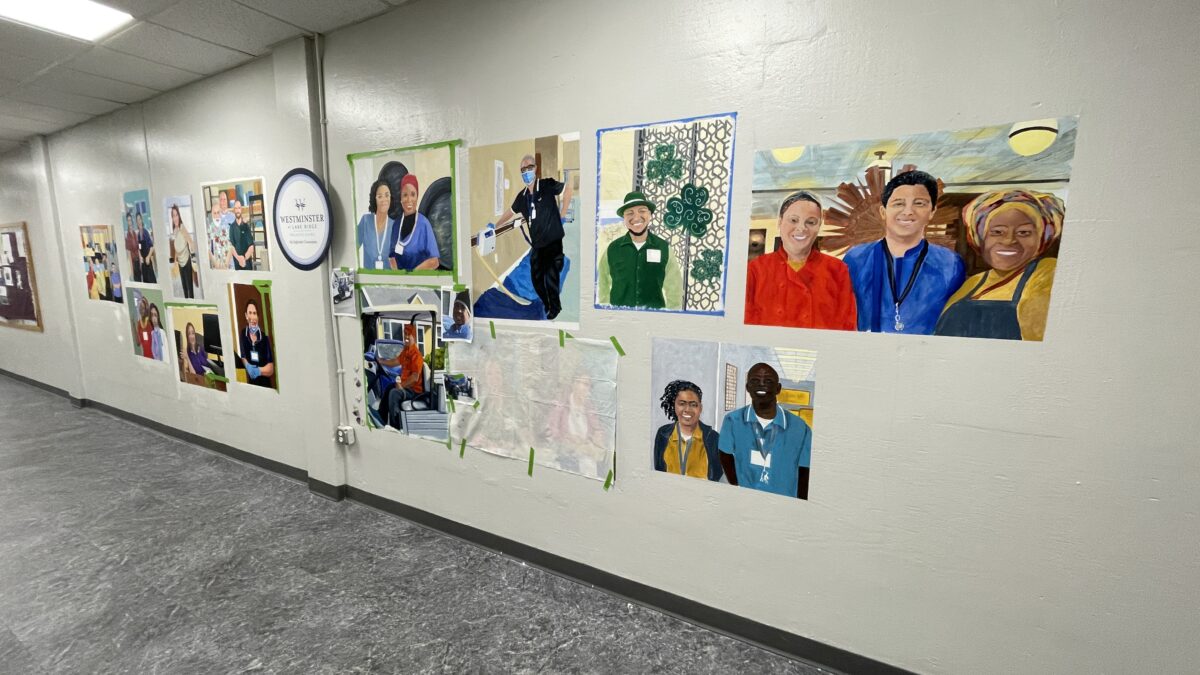 westminster at lake ridge mural in progress honoring staff members