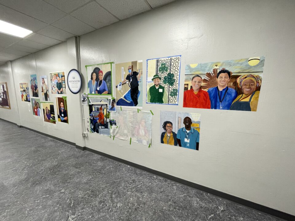 westminster at lake ridge mural in progress honoring staff members