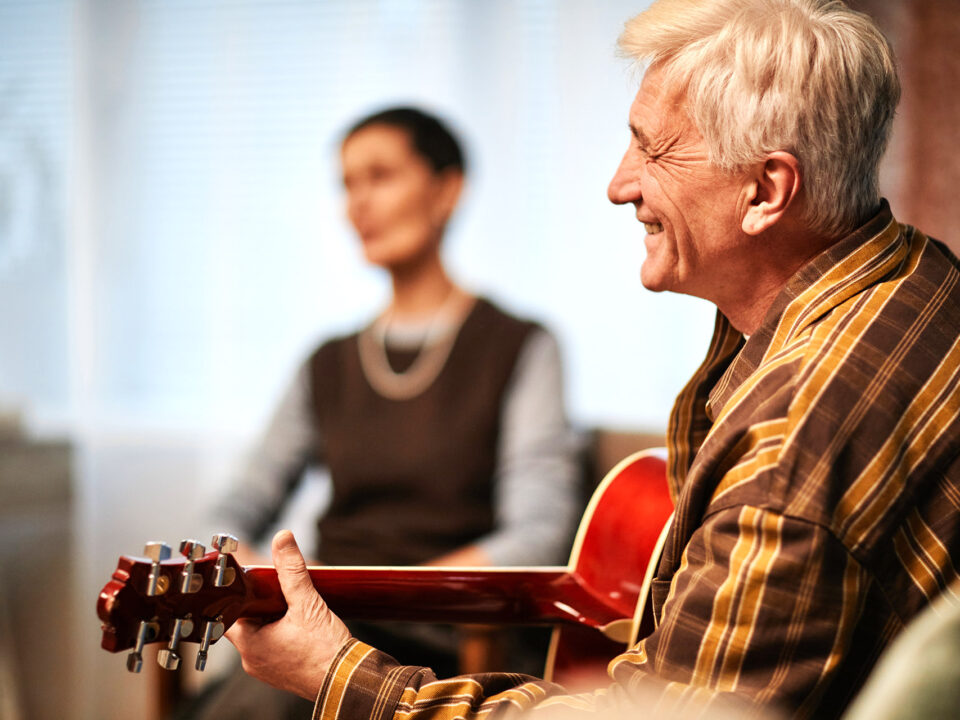 Man playing acoustic guitar